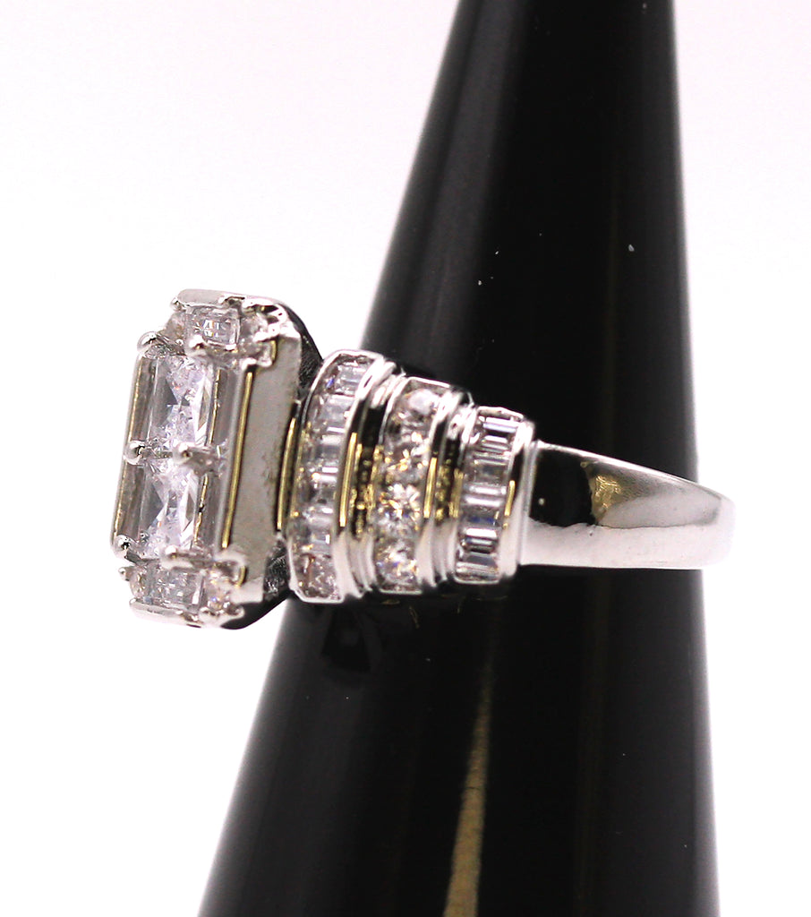 Sparkling women's ring in silver/rhodium plating. Terraced rows of clear zircon gemstones. Side view