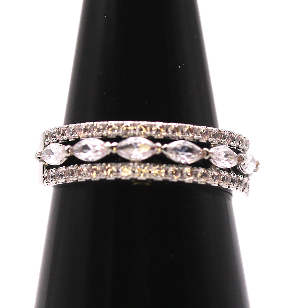 Women's Ring Silver/Rhodium Plated with Zircon Gemstones. The face of the ring is made of a centre row of marquise cut crystals in between two rows of diamond cut crystals.