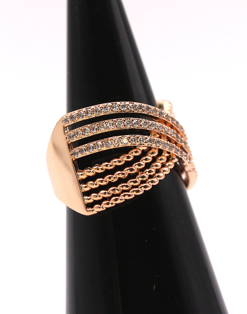 Rose gold plated women's ring. Pave set with zircon gemstones. side view
