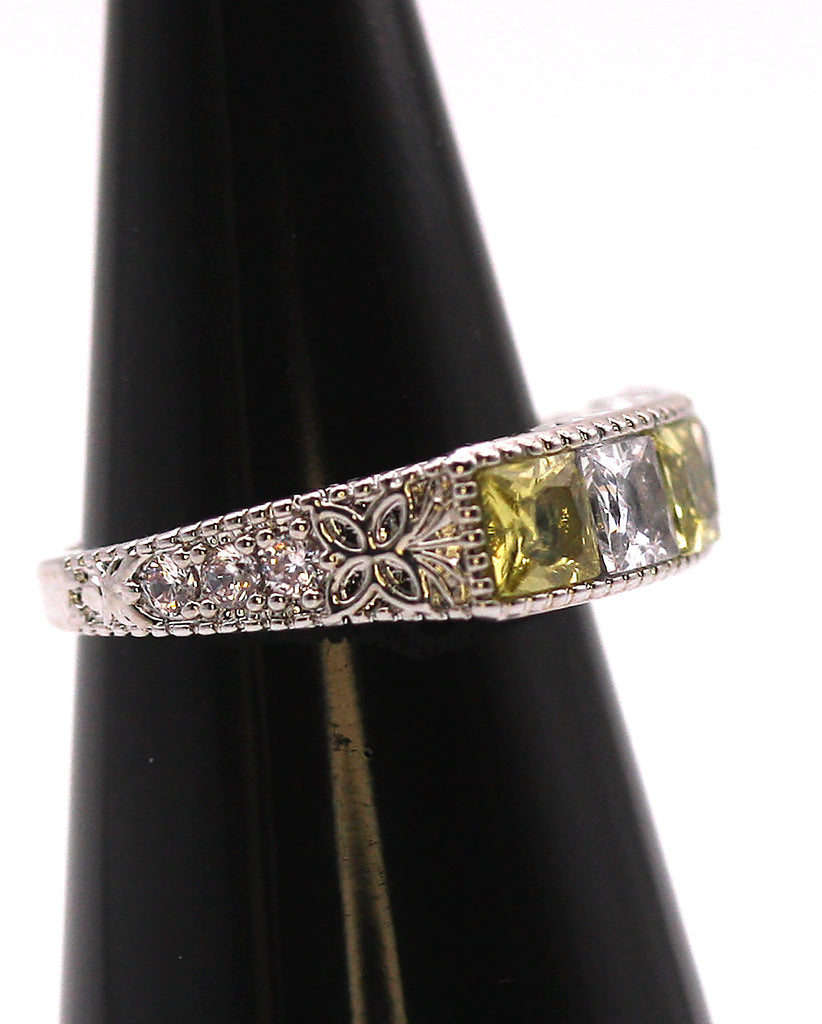 Women's Ring Silver/Rhodium Plated with Perido Green and Clear Zircon Gemstones . Side view