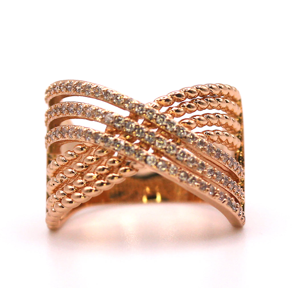 Rose gold plated women's ring. Pave set with zircon gemstones. Front view.