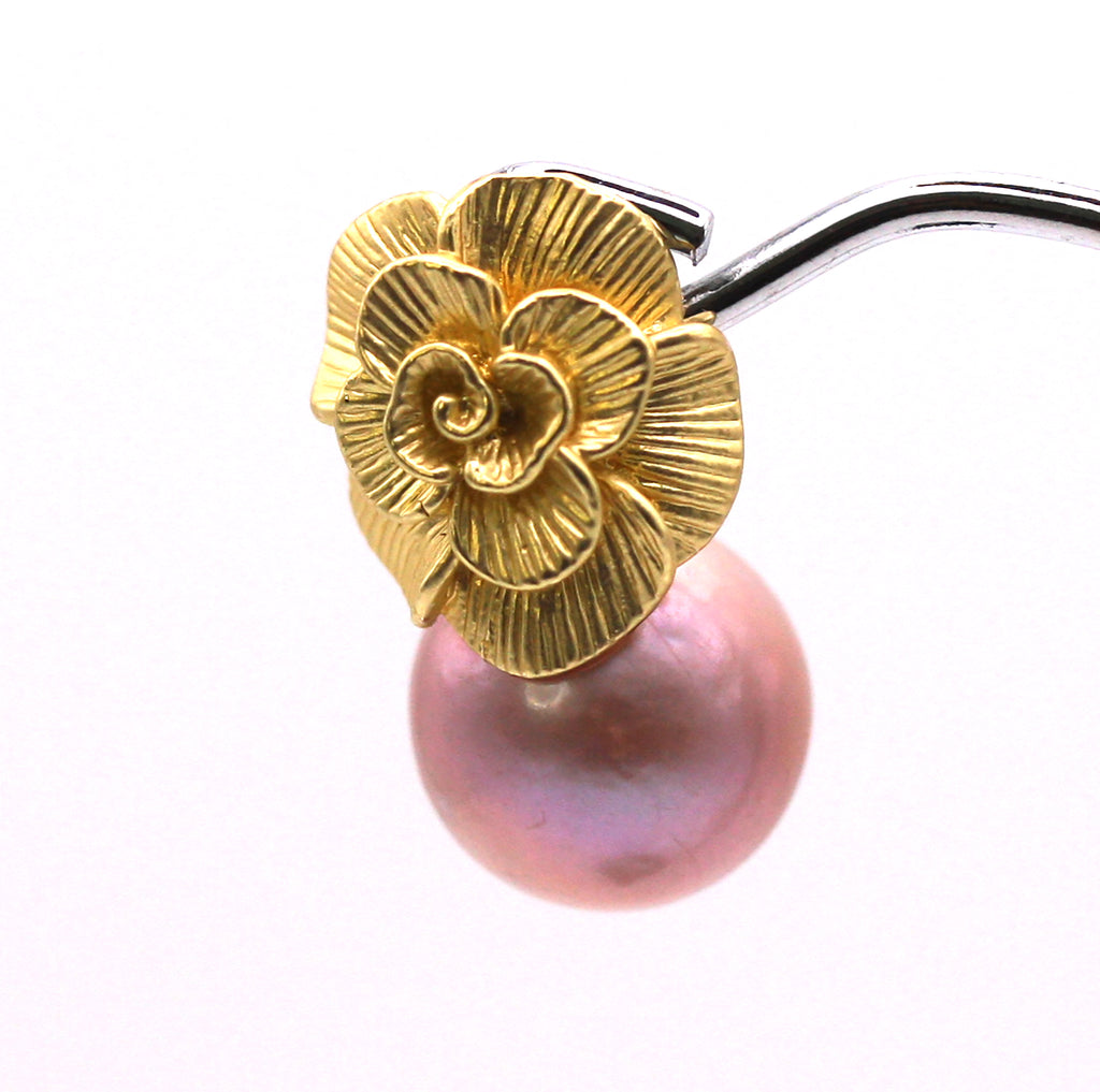 Genuine 12 mm freshwater pearl. Natural lavender colour with gold plated sterling silver flower post stud. Side view