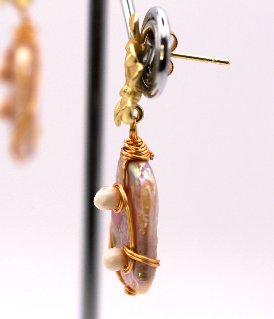 Women's Gold Plated Sterling Silver Earrings with Dangling Genuine Freshwater 20 X 15 mm rectangular baroque pearls. Post stud with three gold plated flowers in sterling silver. Side view