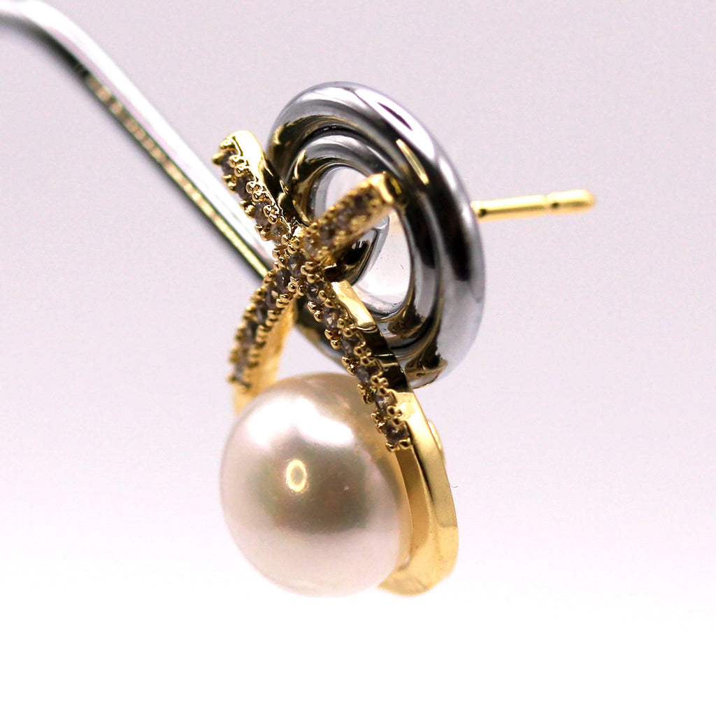 Women's Gold Plated Sterling Silver Earrings with freshwater Pearls. 8 mm white pearl in the centre of a ribbon pave set with clear zircon gemstones. Side view