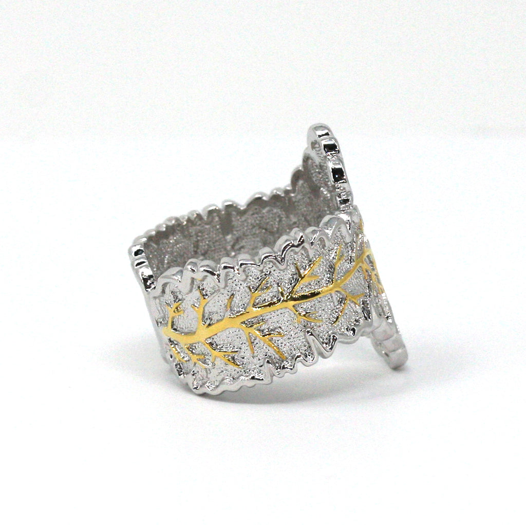 Silver/Rhodium plated women's ring. Leaf pattern with gold veins.
