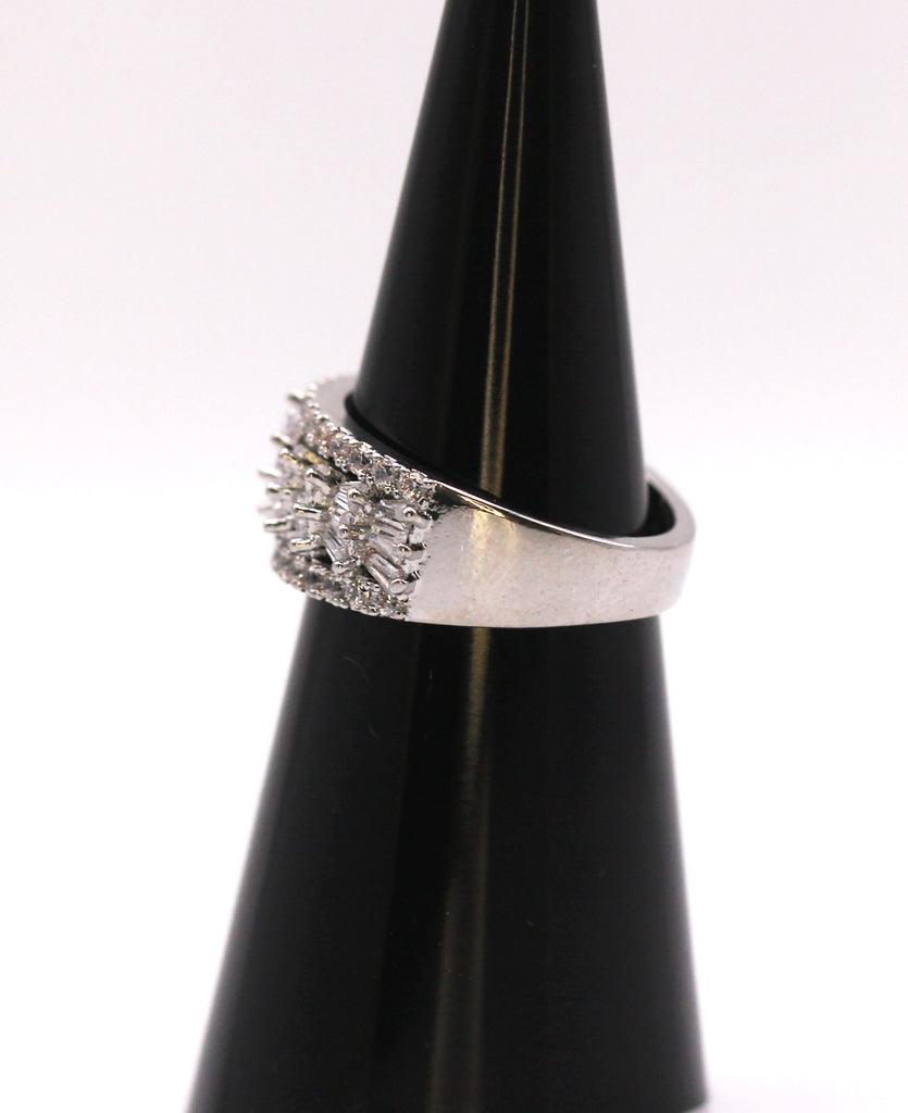 Women's ring. Silver/Rhodium plated ring with rows of clear baguettes and round zircon gemstones.