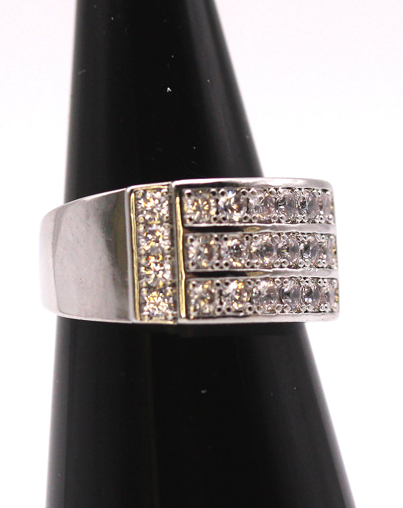 Brilliant and Sparkling Women's Ring in Silver/Rhodium plating. Wide band with multiple clear zircon gemstones.  Side view