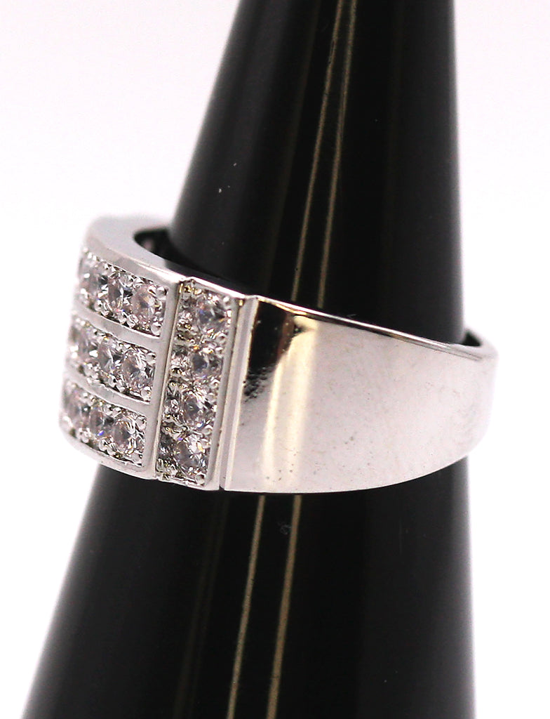 Brilliant and Sparkling Women's Ring in Silver/Rhodium plating. Wide band with multiple clear zircon gemstones.  Side view