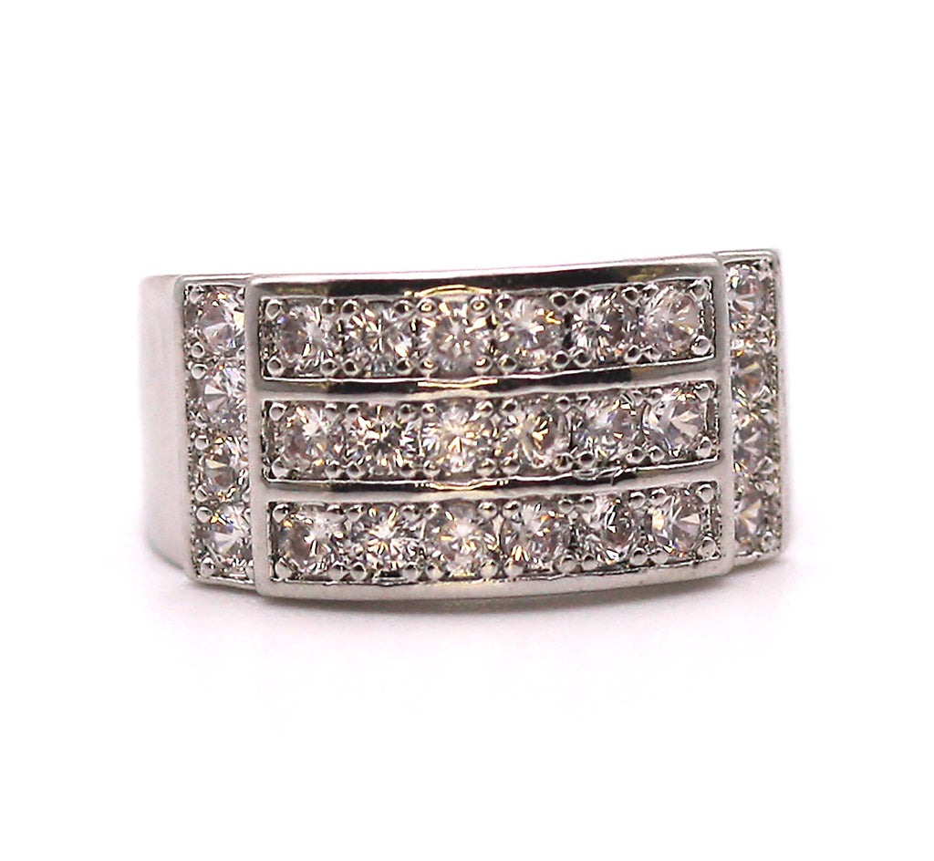 Brilliant and Sparkling Women's Ring in Silver/Rhodium plating. Wide band with multiple clear zircon gemstones. 