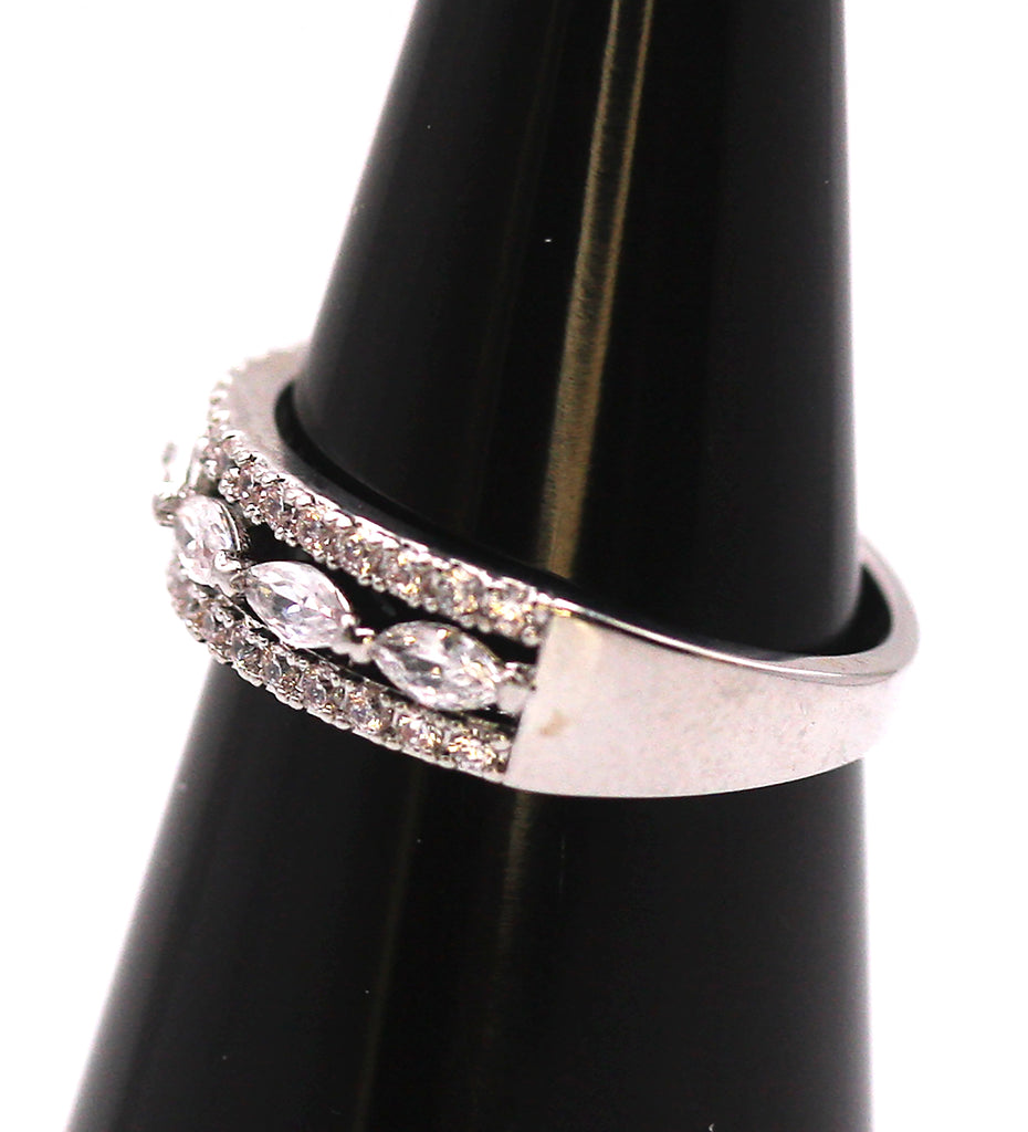 Women's Ring Silver/Rhodium Plated with Zircon Gemstones. The face of the ring is made of a centre row of marquise cut crystals in between two rows of diamond cut crystals. Side view
