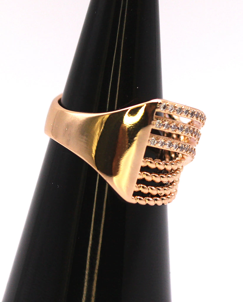 Rose gold plated women's ring. Pave set with zircon gemstones. side view