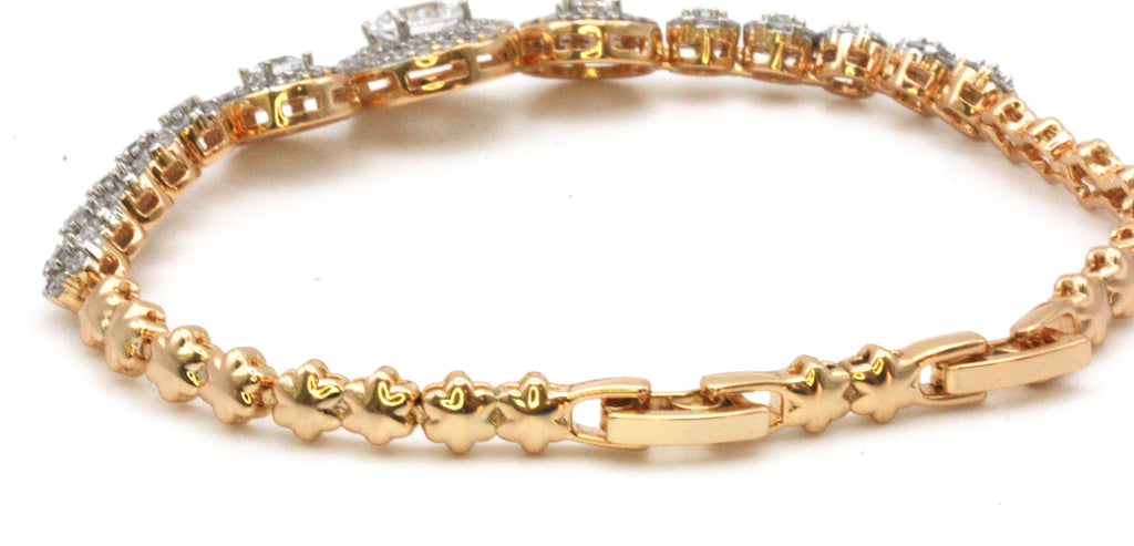 Women's bracelet rose gold plated featuring disks pave set with clear zircon gemstones. 7 inch length with a 1 inch extension.