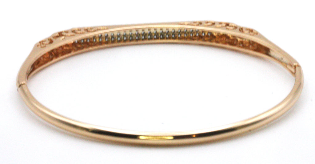 Women's bangle bracelet. Rose gold plated with a flat top pave set with clear zircon gemstones. 