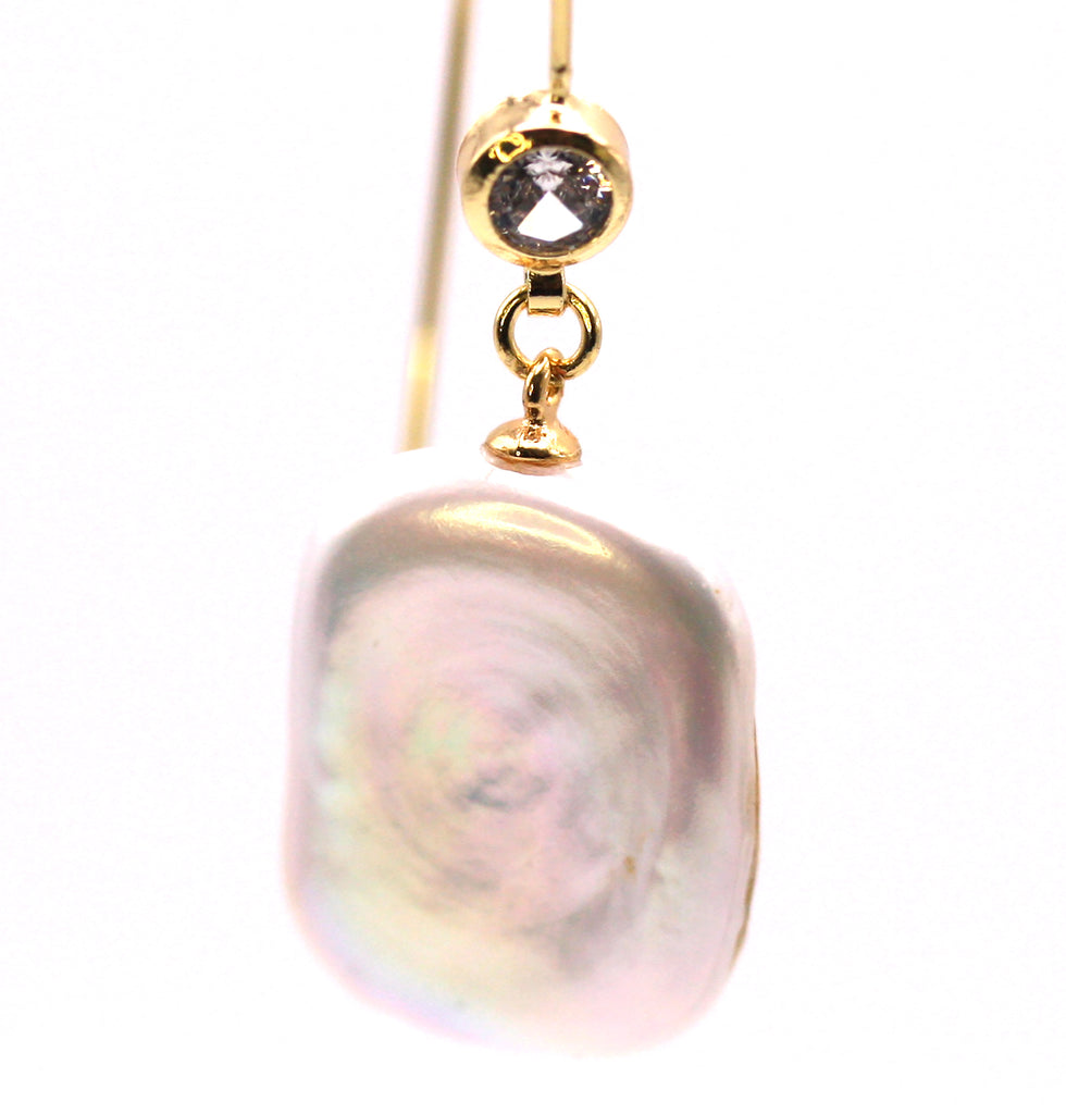 Women's Gold Plated Sterling Silver Earrings with Dangling 20 mm Rectangular freshwater Pearls. The white pearl hangs at the bottom of a thin Sheppard hook accented with a zircon gemstone.