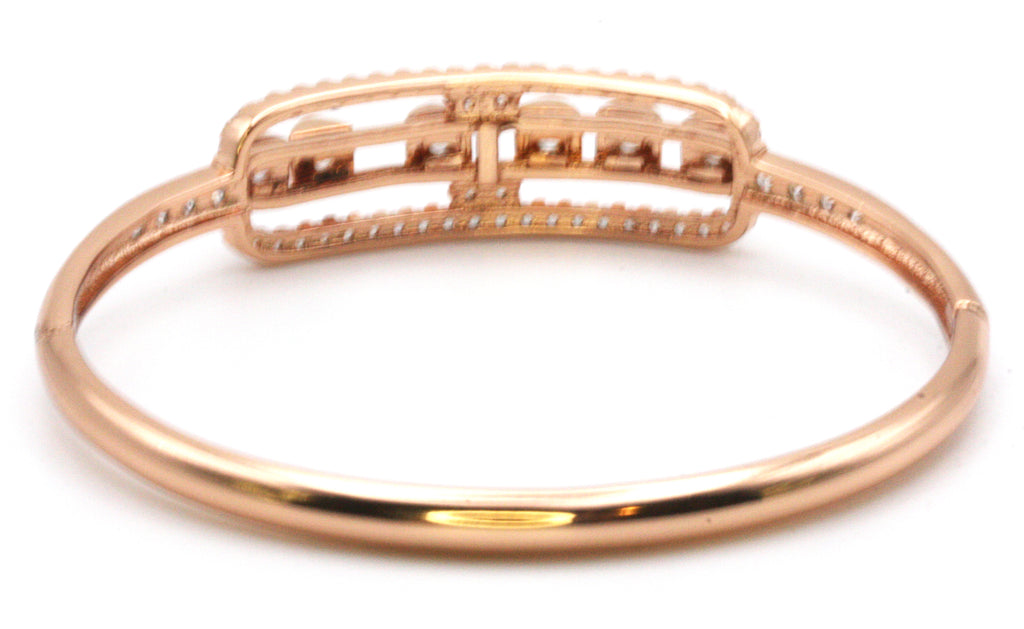 Rose gold plated women's bracelet with a "paper clip" design set with two sizes of clear zircon gemstones.