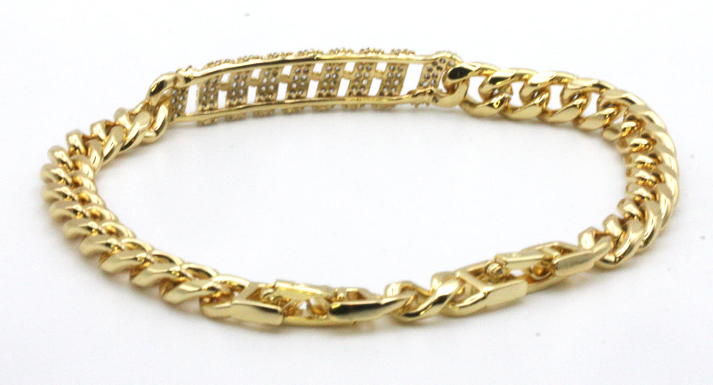 Women's bracelet. Yellow gold-plated Scroll chain links featuring clear zircon gemstones.