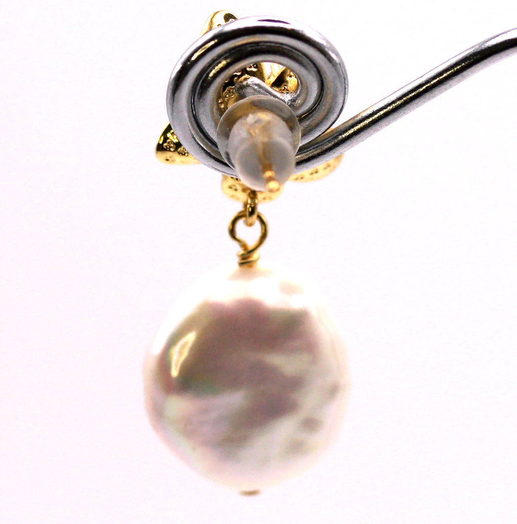 Women's Gold Plated Sterling Silver Earrings with Coin freshwater Pearls.  12 mm white coin pearl with a nice luster and smooth surface dangling below a flower pave set with five clear zircon gemstones. Top post. Back view