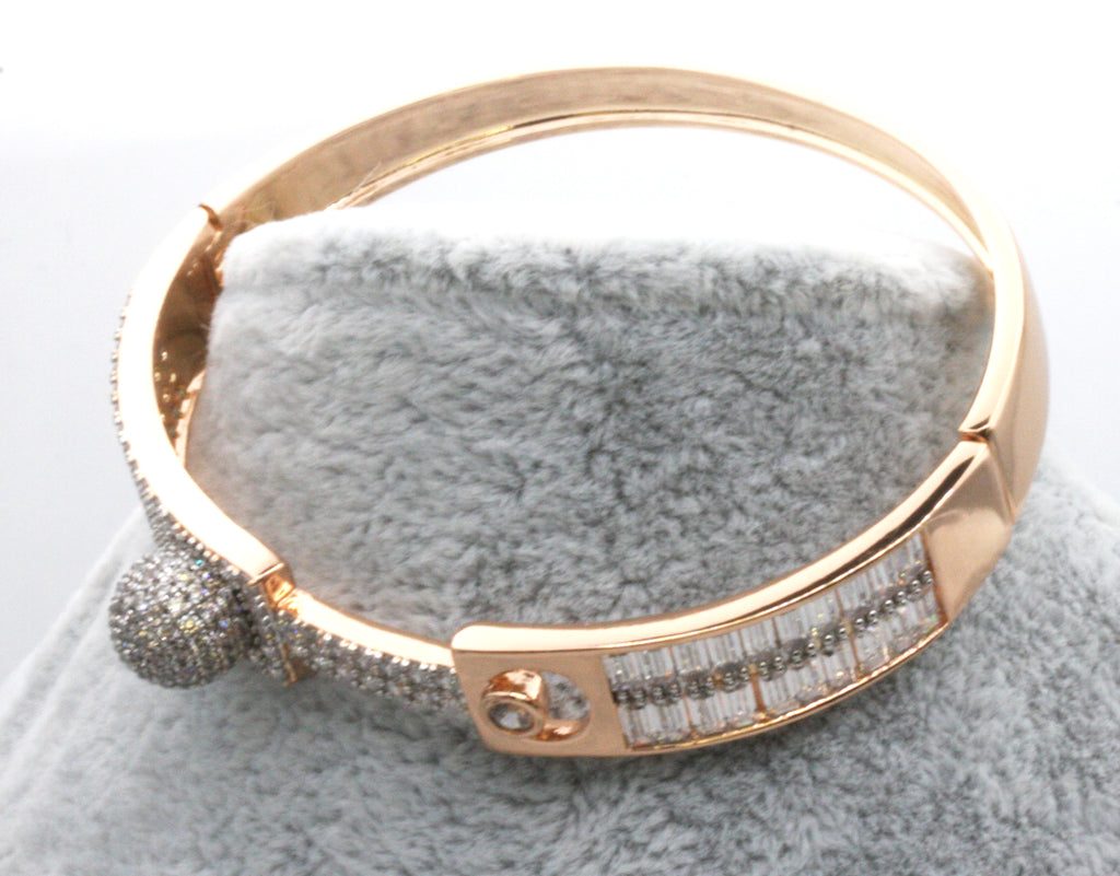 Women's bracelet with a unique design of baguette and clear zircons. Rose gold plated