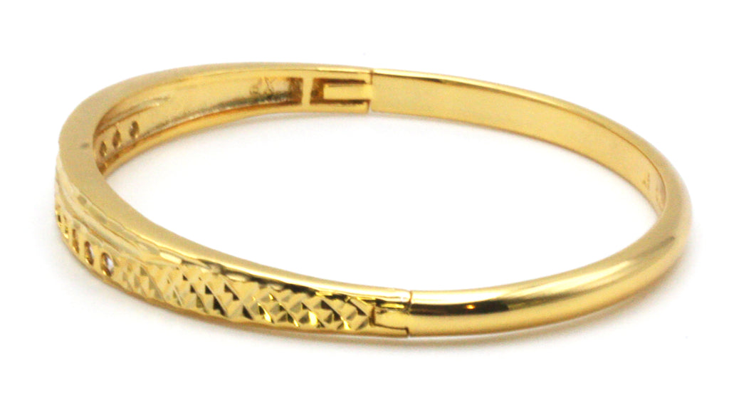 Women's bracelet in yellow gold plating with a single row of clear zircon gemstones